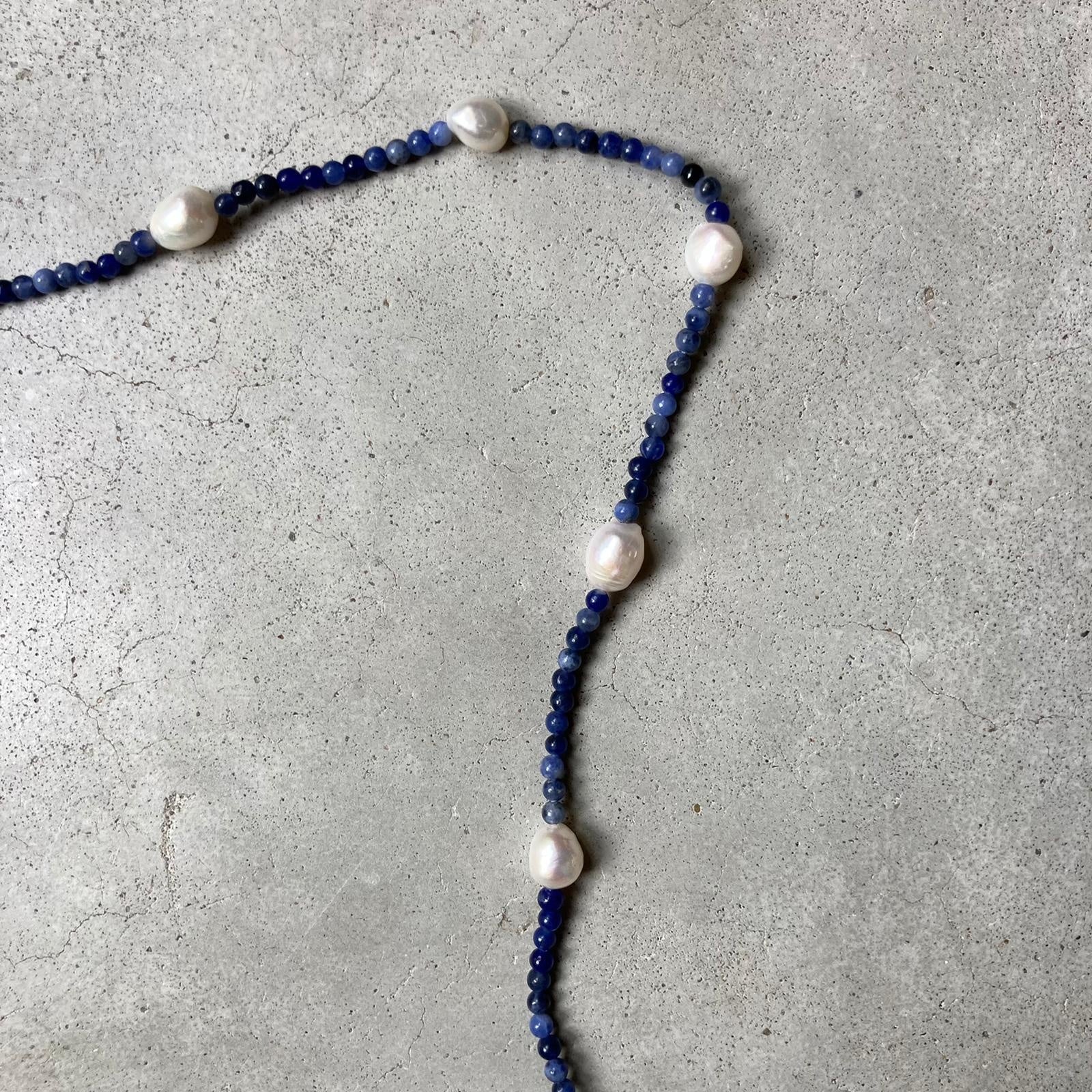 Lapis lazuli stones with pearls